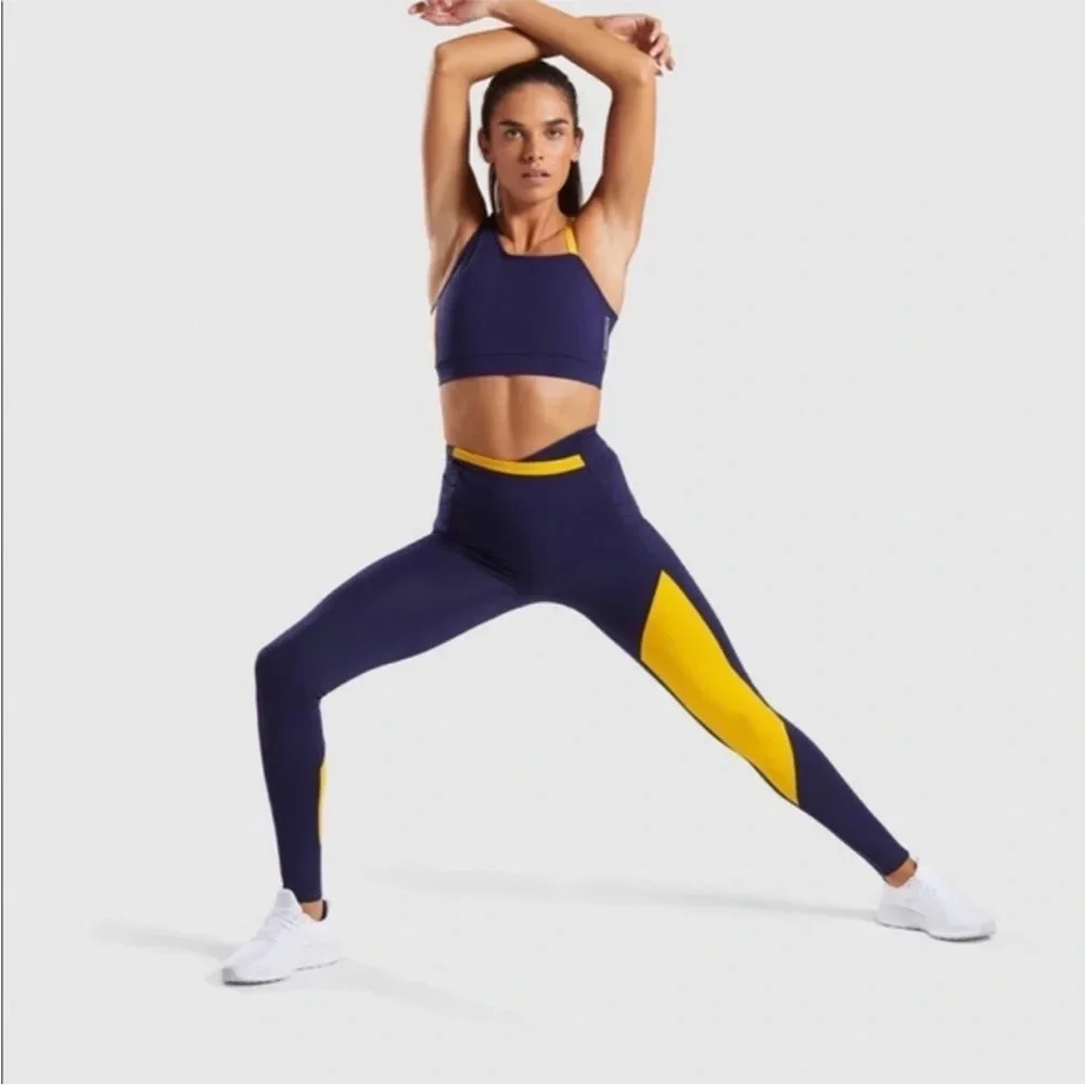 Gymshark Navy Blue Yellow High Rise Asymmetrical Crossover Leggings Size Small